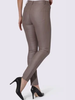 Pantalon effet ventre plat avec coupe skinny et brillance raffinée