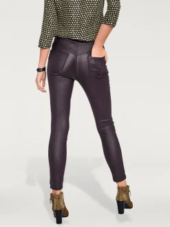 Pantalon effet ventre plat avec coupe skinny et brillance raffinée
