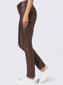 Pantalon effet ventre plat avec coupe skinny et brillance raffinée