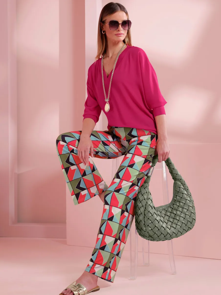 Pantalon en jersey avec motif géométrique et poches latérales