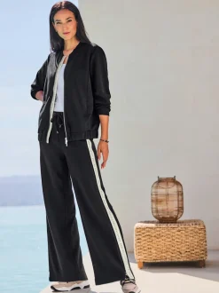 Pantalon en jersey avec rayures contrastées et poches latérales