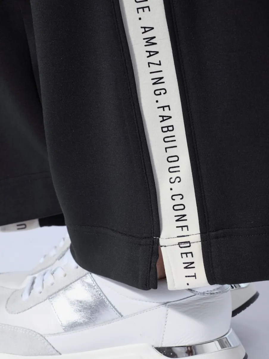 Pantalon en jersey avec rayures contrastées et poches latérales