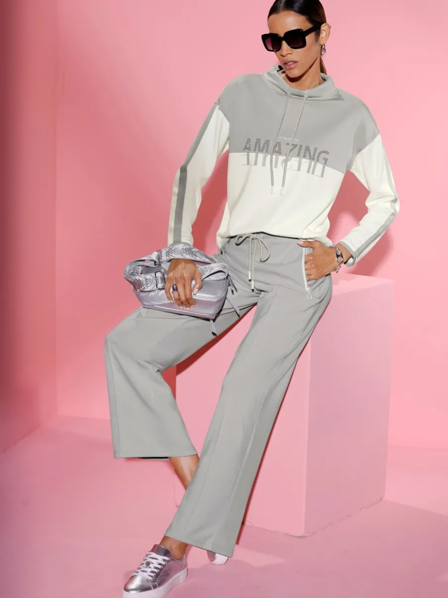 Pantalon en jersey à large ceinture et poches zippées