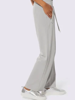 Pantalon en jersey à large ceinture et poches zippées