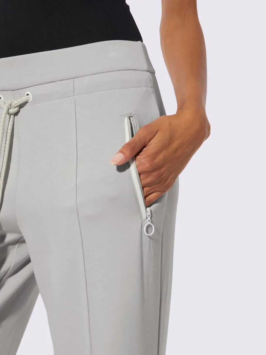 Pantalon en jersey à large ceinture et poches zippées