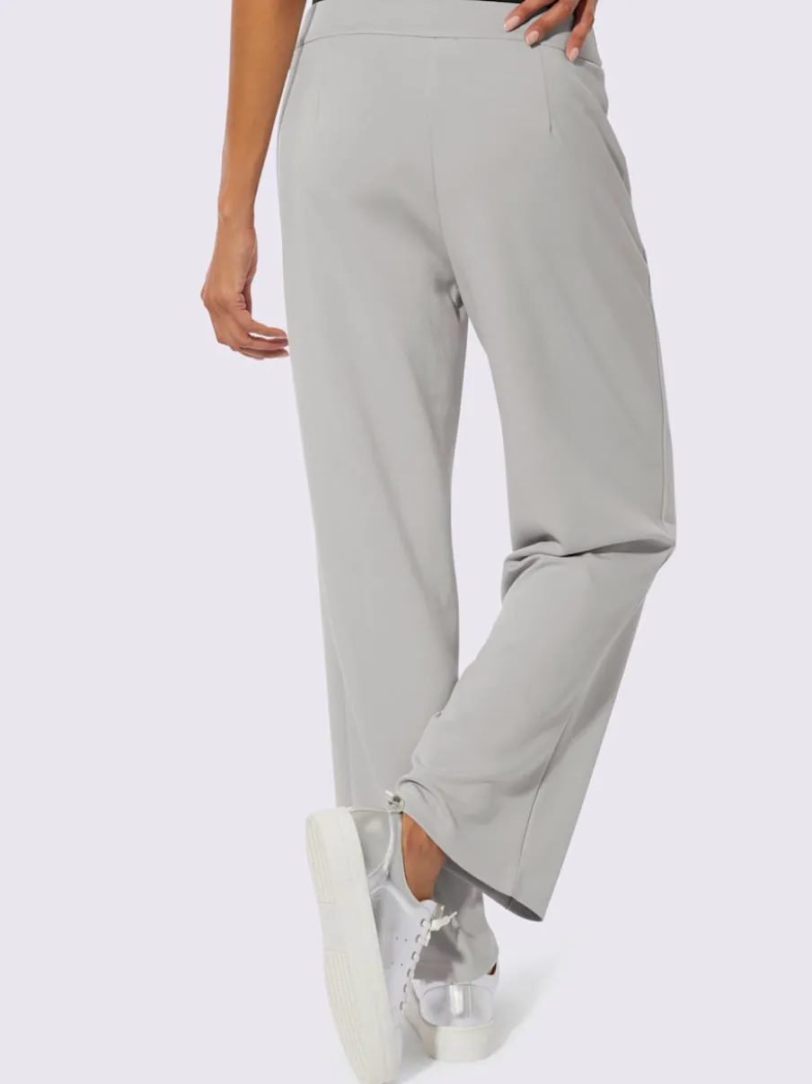 Pantalon en jersey à large ceinture et poches zippées