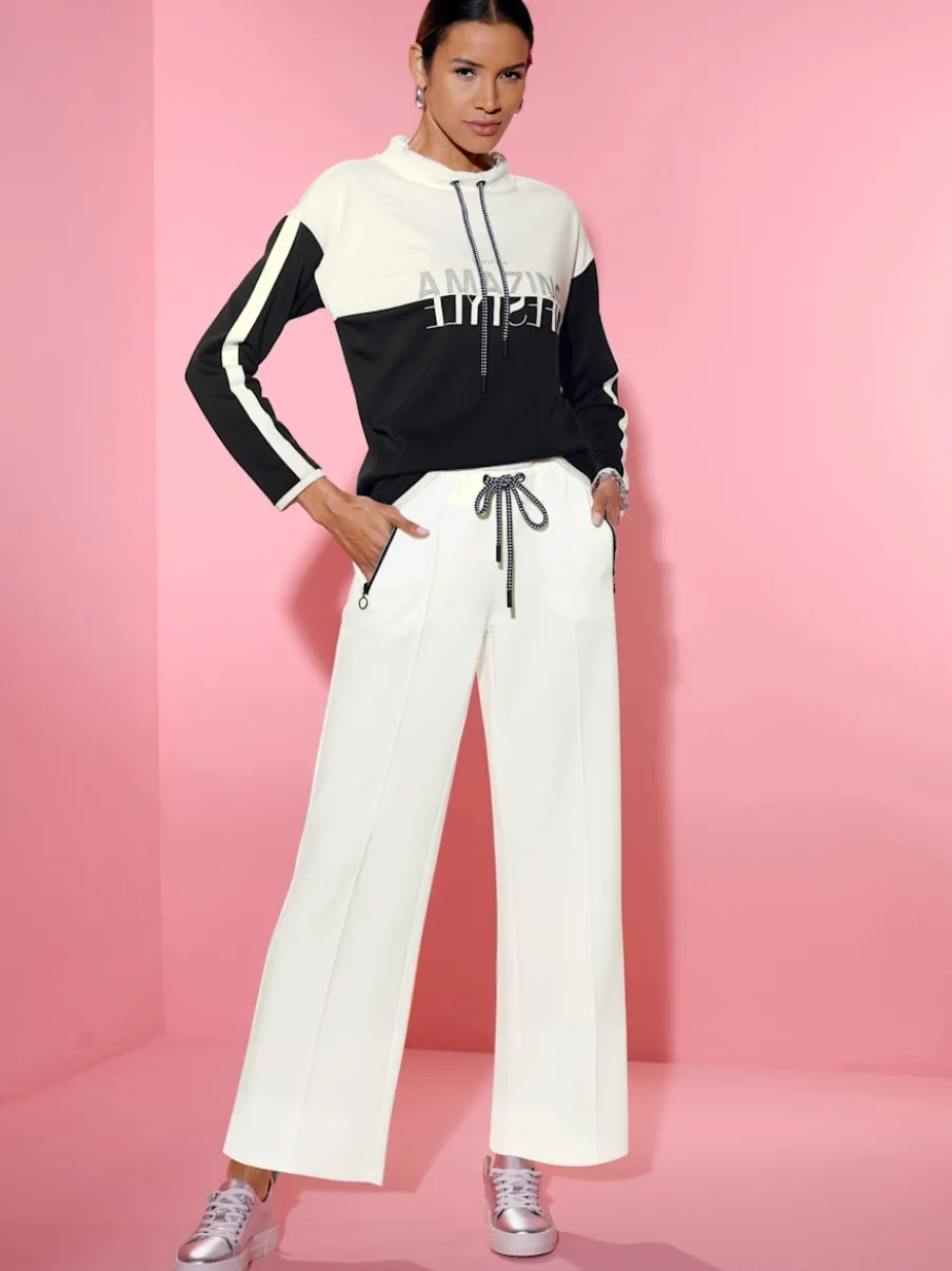 Pantalon en jersey à large ceinture et poches zippées