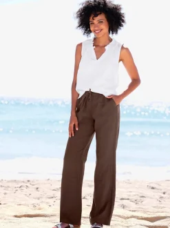 Pantalon en lin avec jambes larges et ceinture élastique