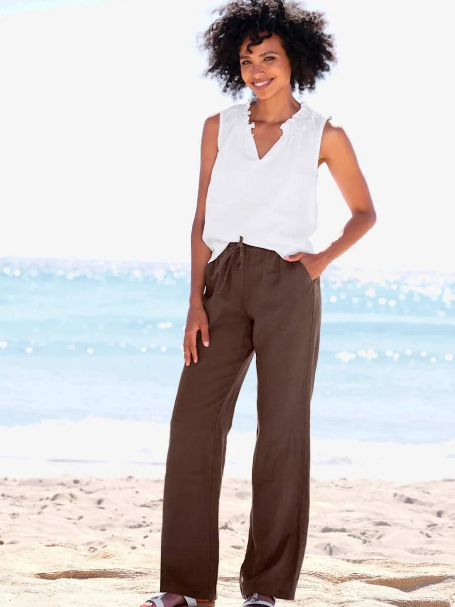 Pantalon en lin avec jambes larges et ceinture élastique