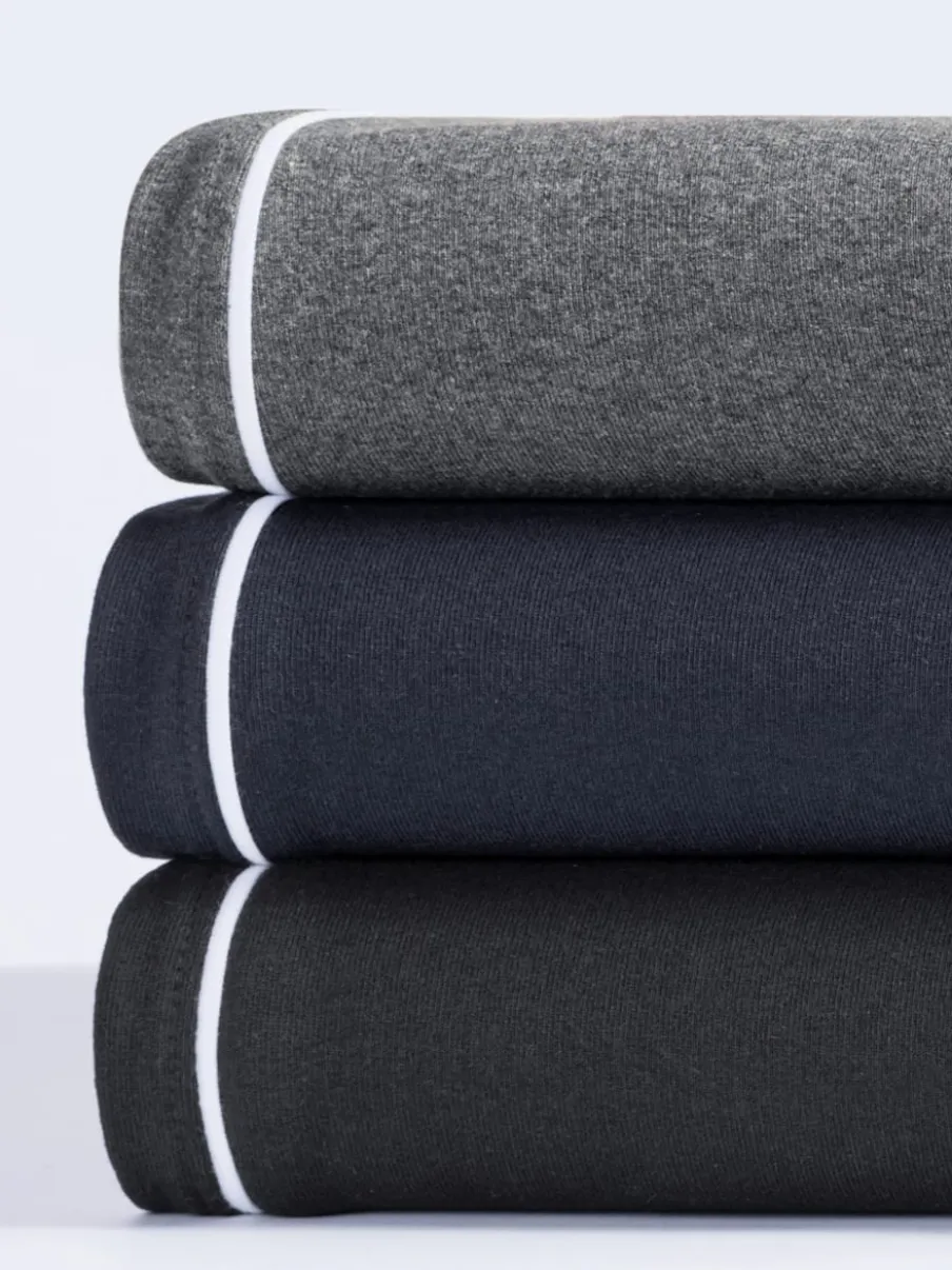 Pantalon en matière sweat avec ceinture élastique et passepoil sportif