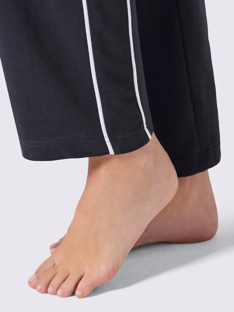 Pantalon en matière sweat avec ceinture élastique et passepoil sportif