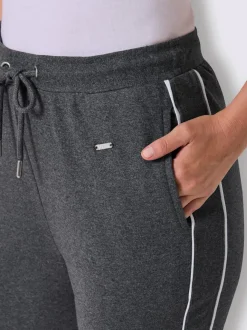 Pantalon en matière sweat avec ceinture élastique et passepoil sportif