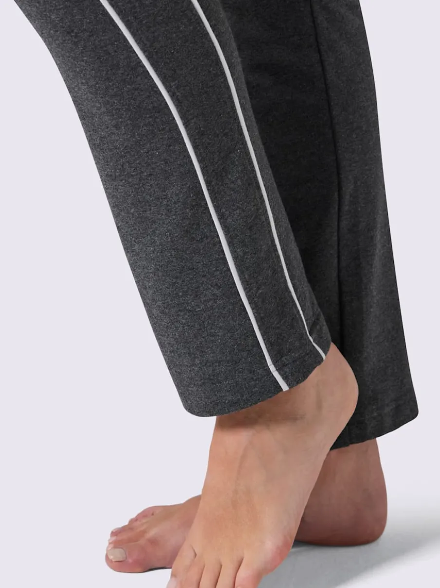 Pantalon en matière sweat avec ceinture élastique et passepoil sportif