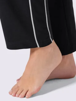 Pantalon en matière sweat avec ceinture élastique et passepoil sportif