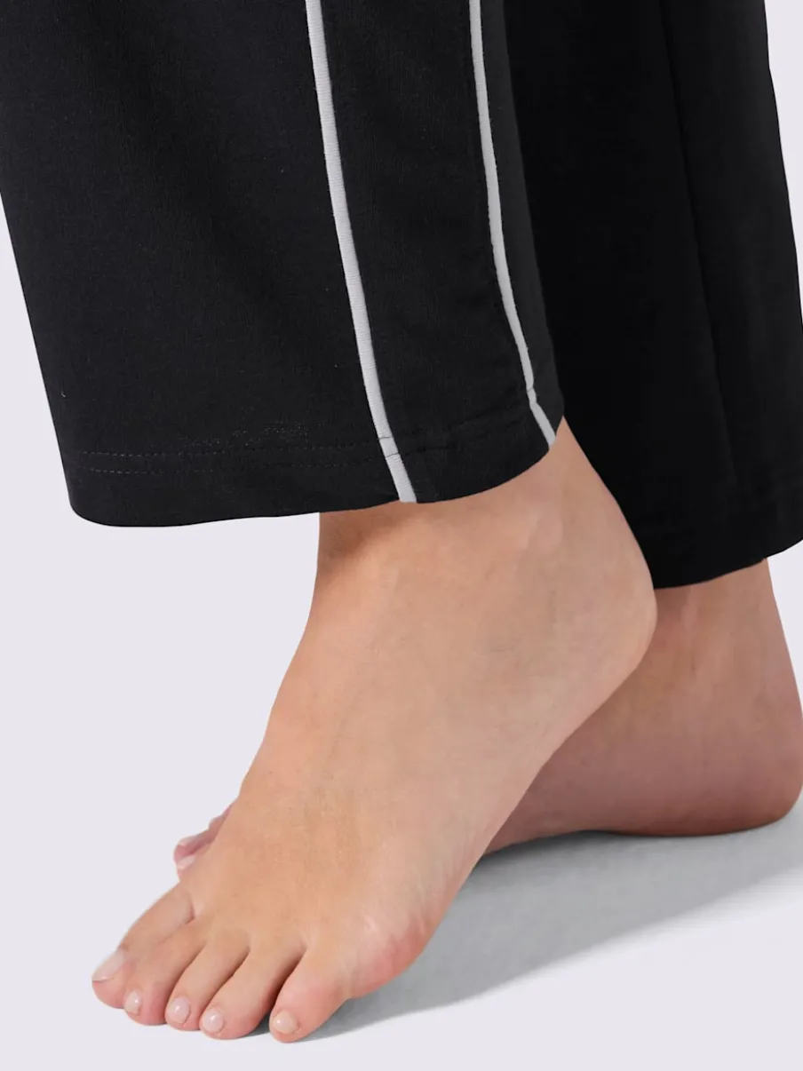 Pantalon en matière sweat avec ceinture élastique et passepoil sportif