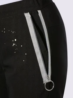 Pantalon extensible avec inscription décorative et poches zippées