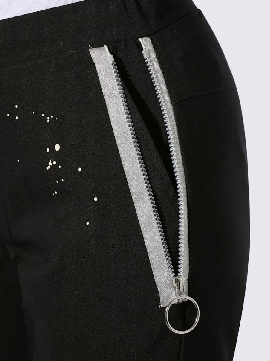 Pantalon extensible avec inscription décorative et poches zippées