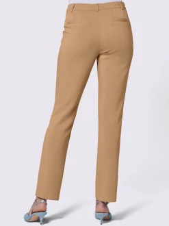 Pantalon extensible à poches et nervures pour un effet affinant