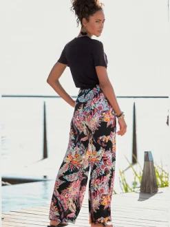 Pantalon fluide avec ceinture élastiquée et imprimé coloré
