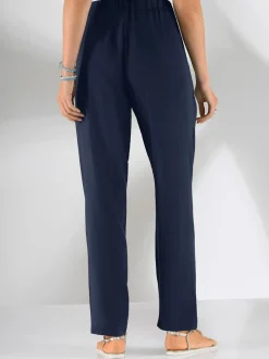 Pantalon fluide avec ceinture élastique et poches latérales