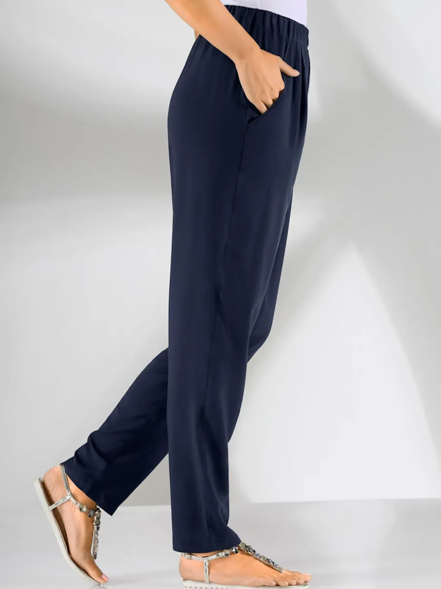 Pantalon fluide avec ceinture élastique et poches latérales
