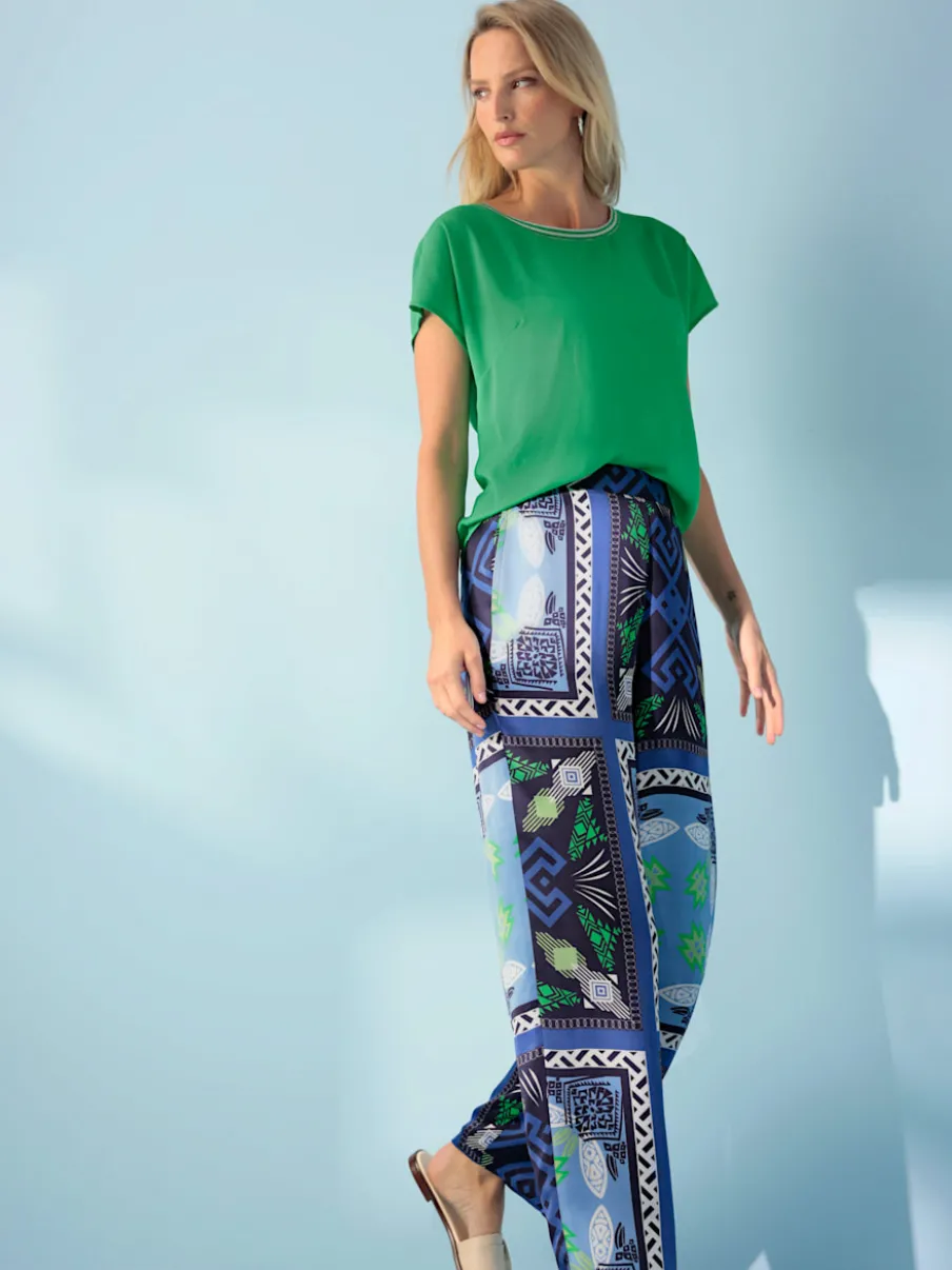 Pantalon fluide à motif avec ceinture élastique et poches latérales