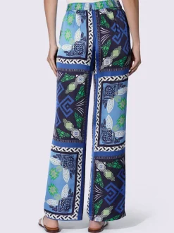 Pantalon fluide à motif avec ceinture élastique et poches latérales