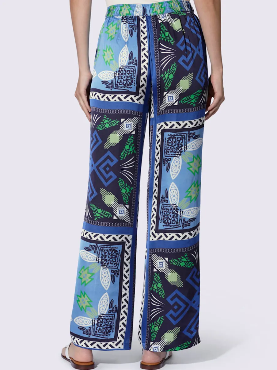 Pantalon fluide à motif avec ceinture élastique et poches latérales