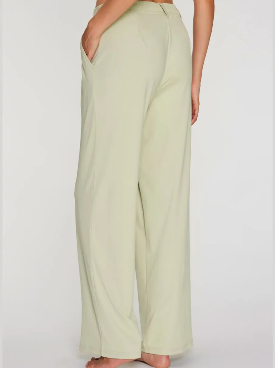Pantalon fluide à taille haute avec poches latérales et jambes larges