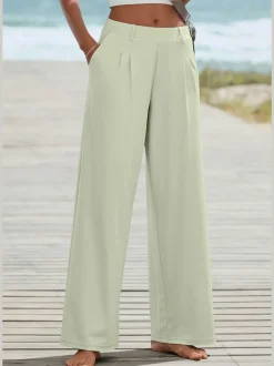 Pantalon fluide à taille haute avec poches latérales et jambes larges