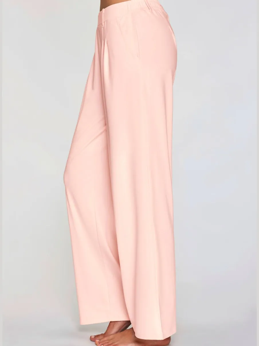 Pantalon fluide à taille haute avec poches latérales et jambes larges