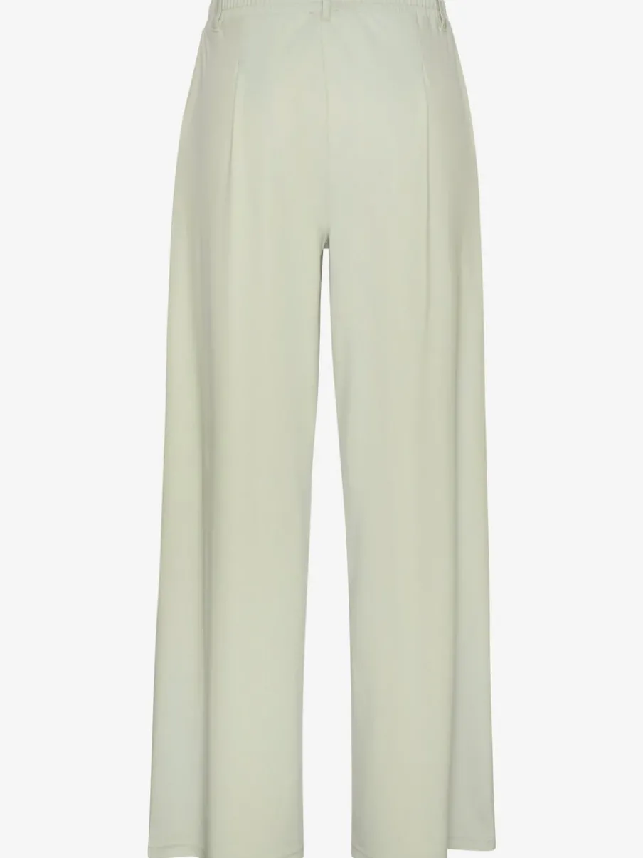 Pantalon fluide à taille haute avec poches latérales et jambes larges