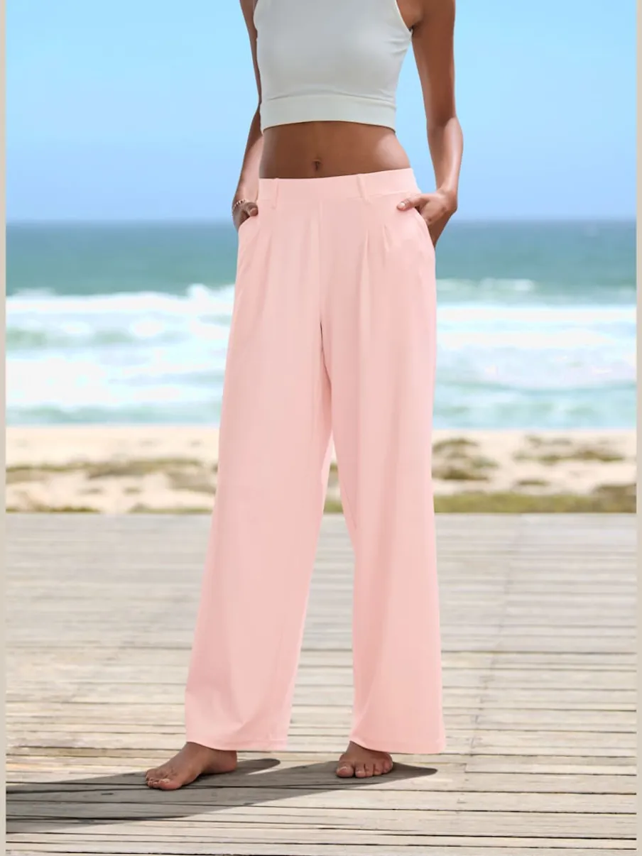 Pantalon fluide à taille haute avec poches latérales et jambes larges