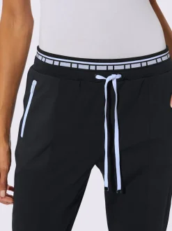 Pantalon jogpant à double ceinture avec poches zippées
