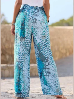Pantalon large avec ceinture à nouer et poches pratiques