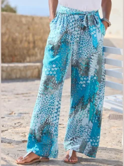 Pantalon large avec ceinture à nouer et poches pratiques
