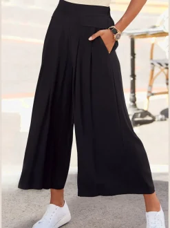 Pantalon large avec ceinture élastique et poches fendues