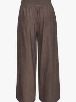 Pantalon large avec ceinture smockée et poches fendues