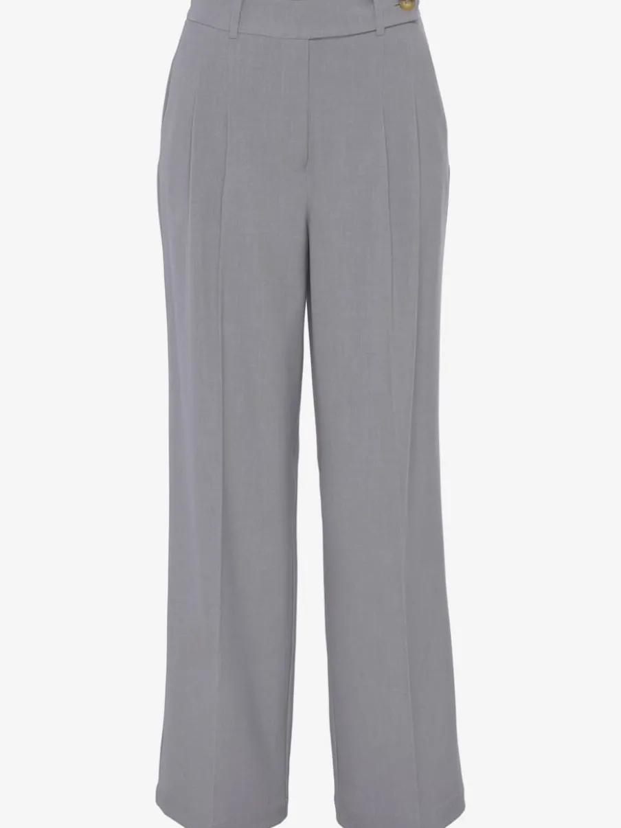 Pantalon large avec pinces à poches fendues et décoratives