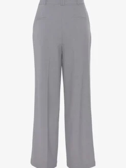 Pantalon large avec pinces à poches fendues et décoratives