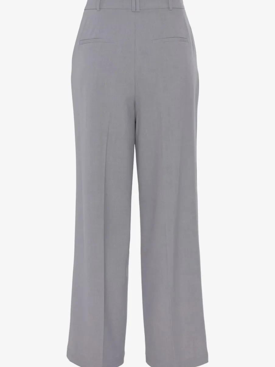 Pantalon large avec pinces à poches fendues et décoratives