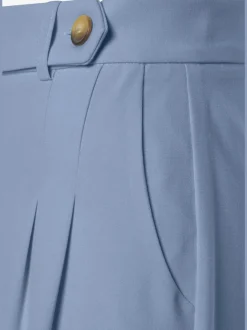 Pantalon large avec pinces à poches fendues et décoratives