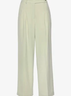 Pantalon large avec pinces à poches fendues et décoratives