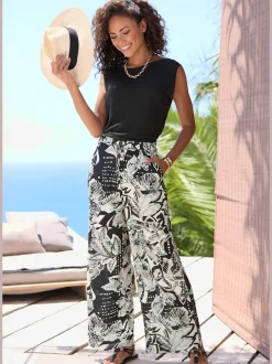 Pantalon large avec poches latérales et imprimé floral