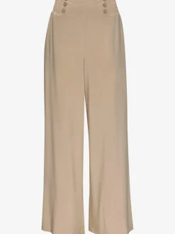 Pantalon large avec poches latérales et détails smockés