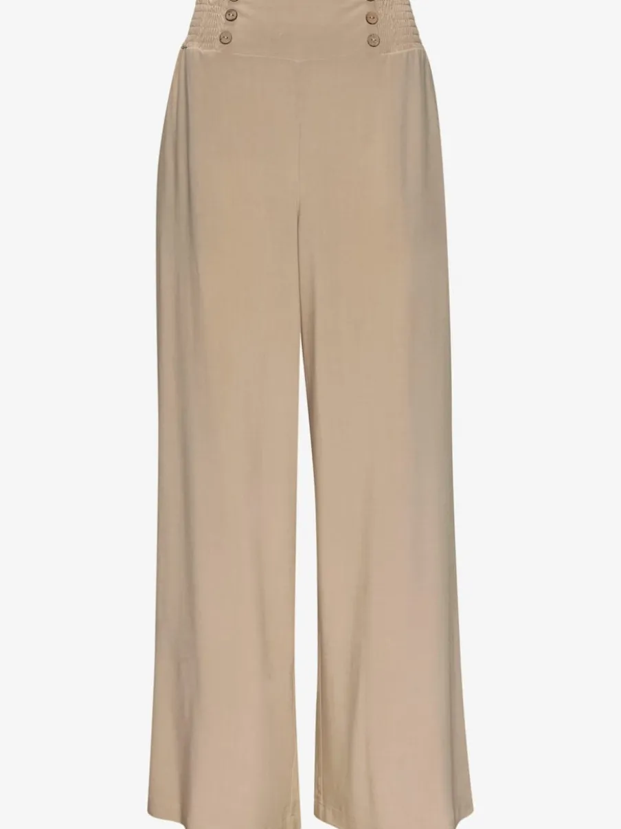Pantalon large avec poches latérales et détails smockés