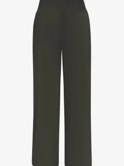 Pantalon large avec poches latérales et détails smockés