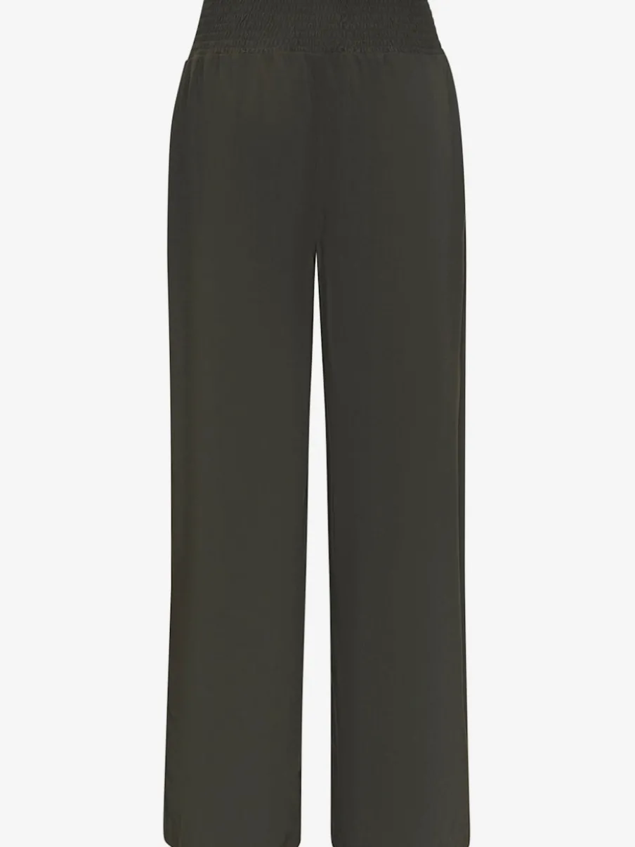 Pantalon large avec poches latérales et détails smockés