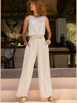 Pantalon à large ceinture élastique avec jambes plissées et poches latérales