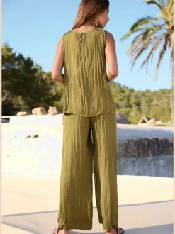Pantalon à large ceinture élastique avec jambes plissées et poches latérales